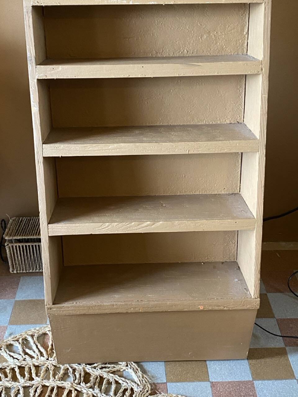 Painted wooden display shelf with an incline