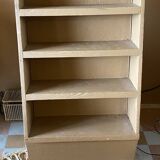 Painted wooden display shelf with an incline