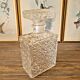 Rectangular whisky carafe made in France with geometric patterns.