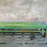 Old wooden bench sidetable green
