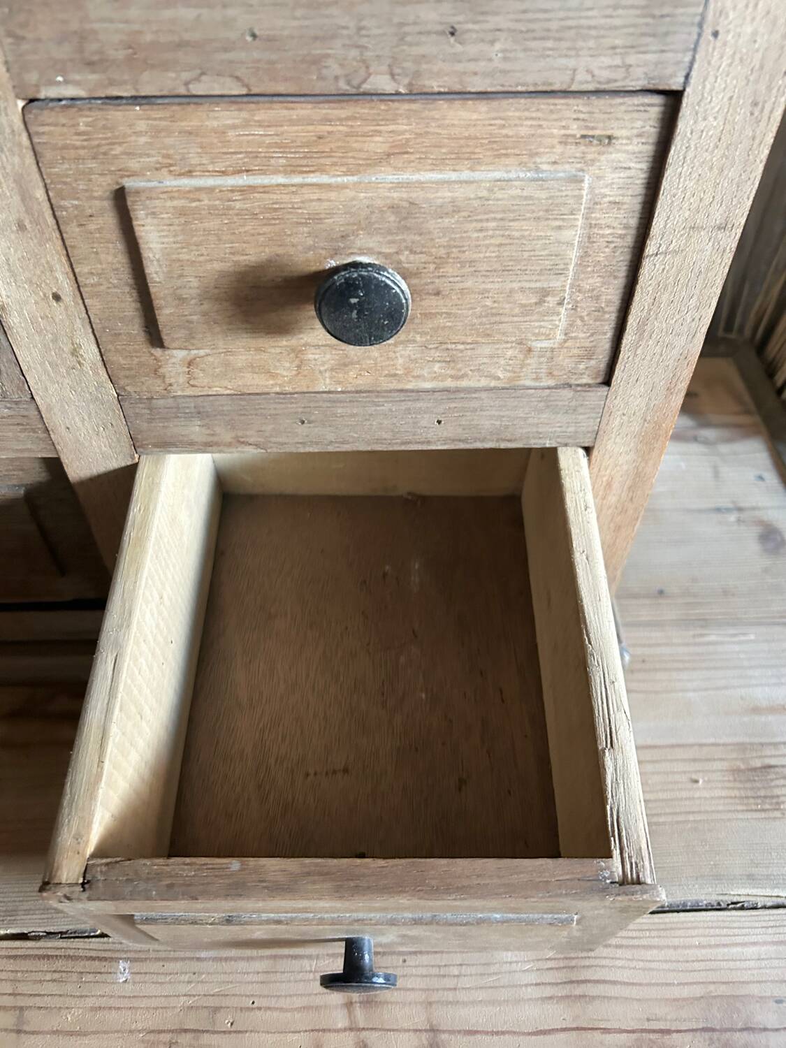 Small piece of furniture with glass doors and drawers