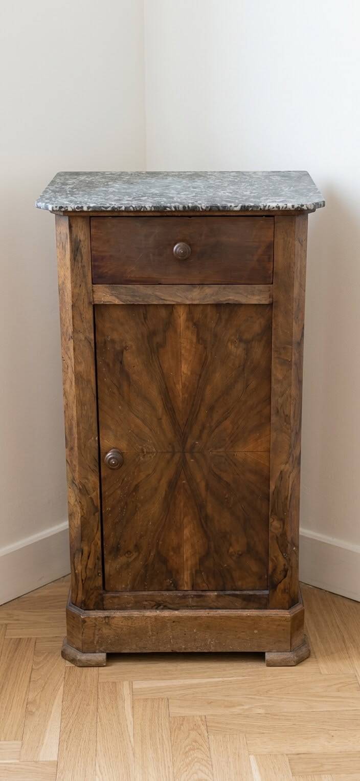 Antique bedside table in wood and grey marble, old brown.