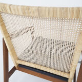 Rattan and leather low-back lounge chair by P.J. Muntendam for Gebr. Jonkers, The Netherlands 1950's