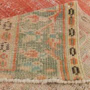 Tapis vintage rouge pâle