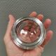 A set of iittala candle holders in clear transparent glass.