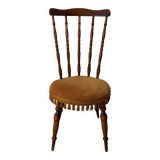Wooden chair with yellow velvet