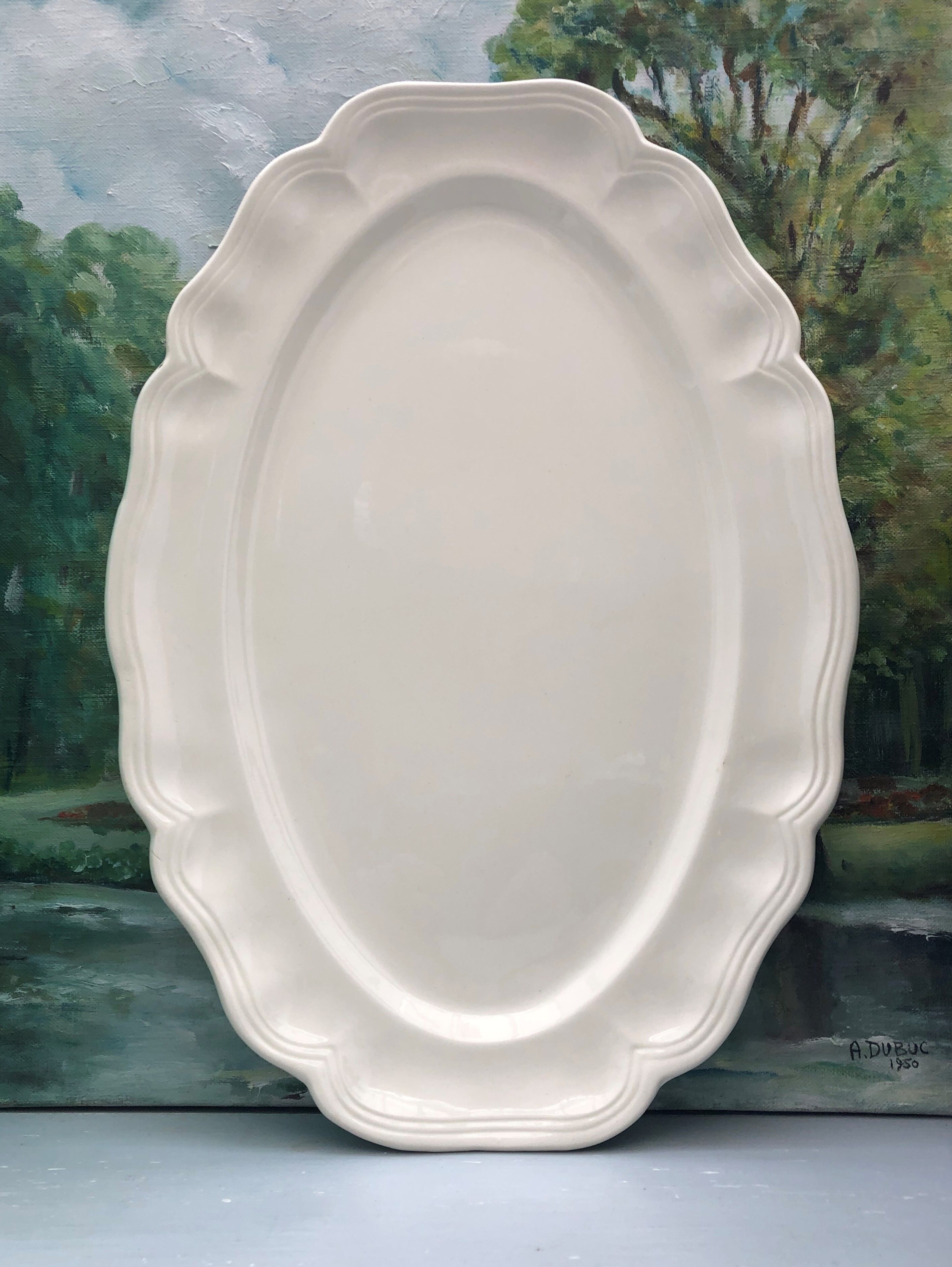Oval ivory dish with gadroons, signed Sarreguemines France.