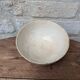 Old opaque porcelain bowl from Gien with a floral decoration.