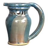Stoneware pitcher.