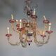Venetian Rezzonico chandelier in colourless and red Murano glass, circa 1900.