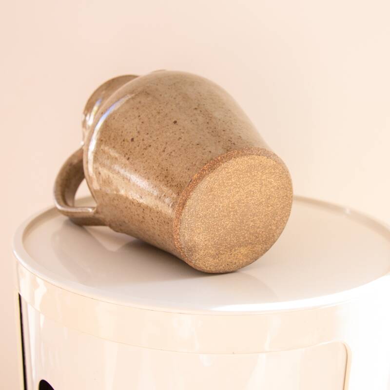 Stoneware carafe signed CA on handle