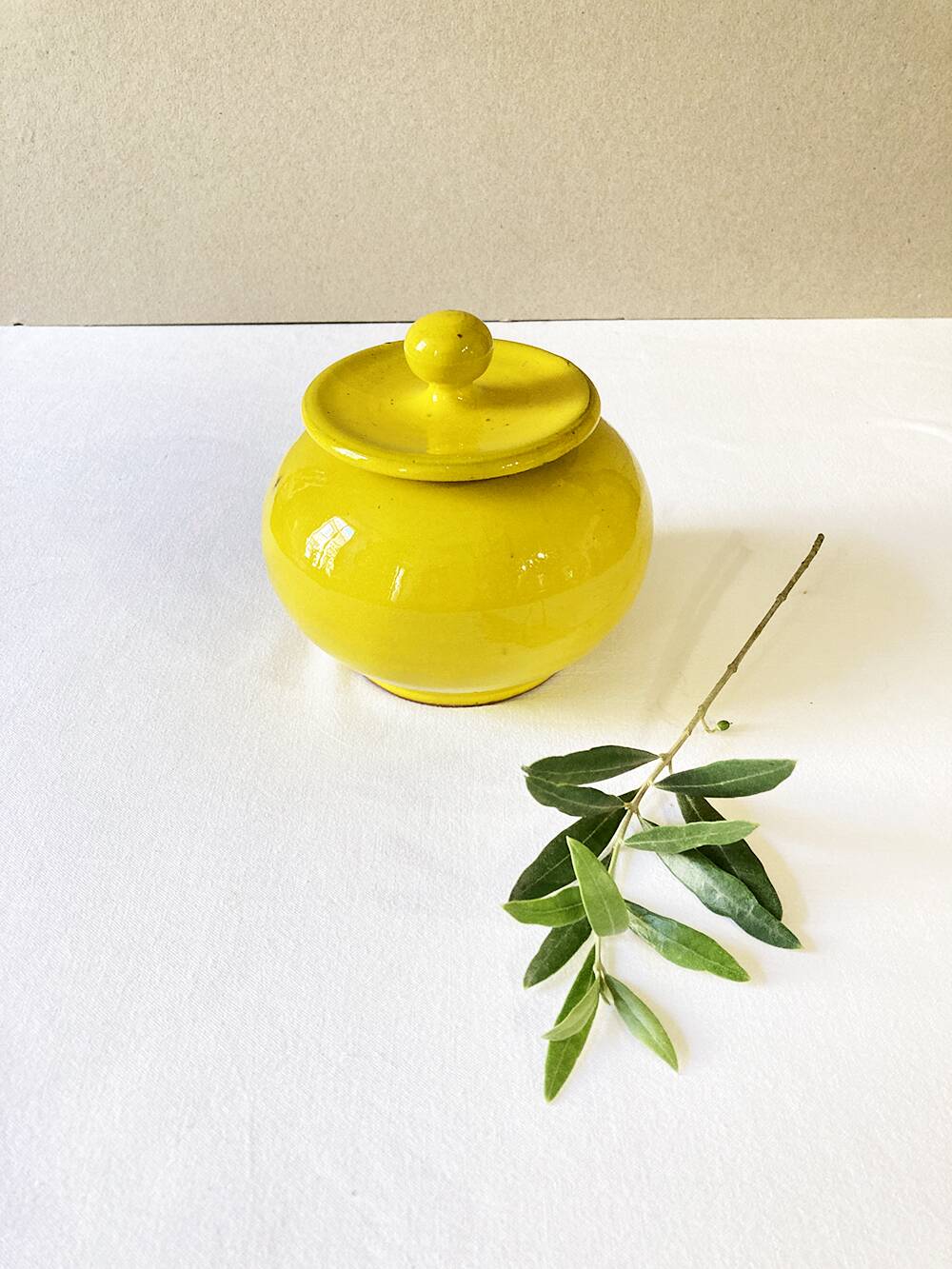 Yellow glazed ceramic sugar bowl
