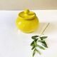 Yellow glazed ceramic sugar bowl