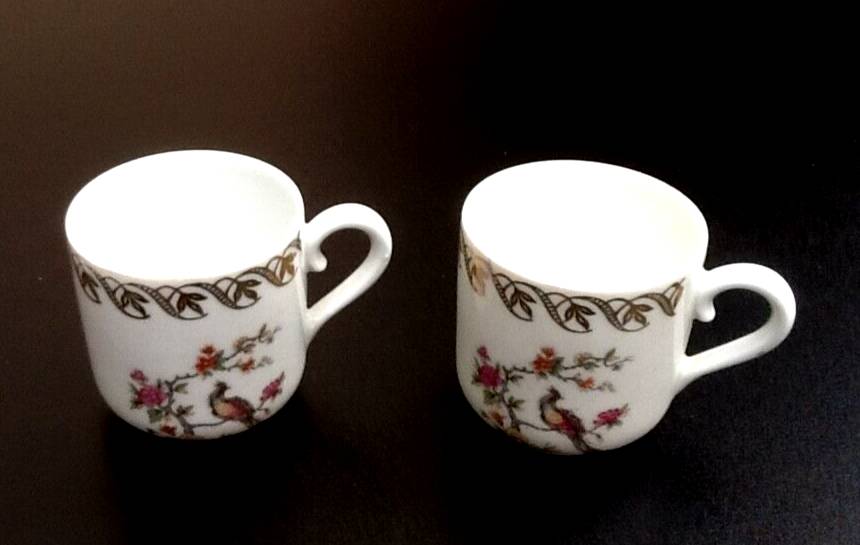Two PL coffee cups (Limousine Porcelain) the crowned swallow