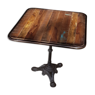 Wooden tray bistro table with old cast iron base