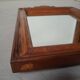 Wooden hanging mirror with vintage carved knot