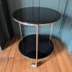 Vintage side table on wheels – black glass top