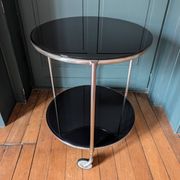 Vintage side table on wheels – black glass top