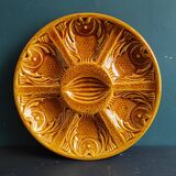 Vintage French amber oyster plate in Majolica decorated with fishes