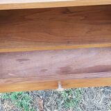 Wooden bedside table with compass feet