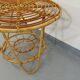 Round coffee table with 60's vintage rattan magazine tray
