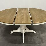 Round extendable oak dining table