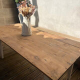Old farm table with white base and drawer