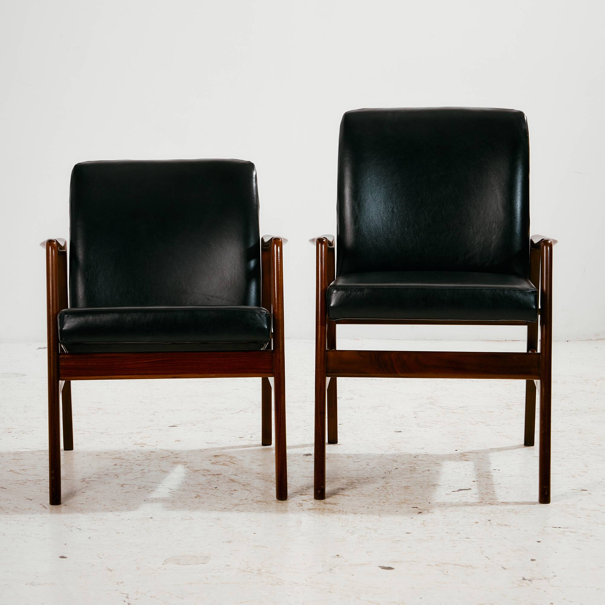 Teak armchair with leather upholstery