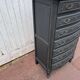 Louis XV style chest of drawers, black patina.