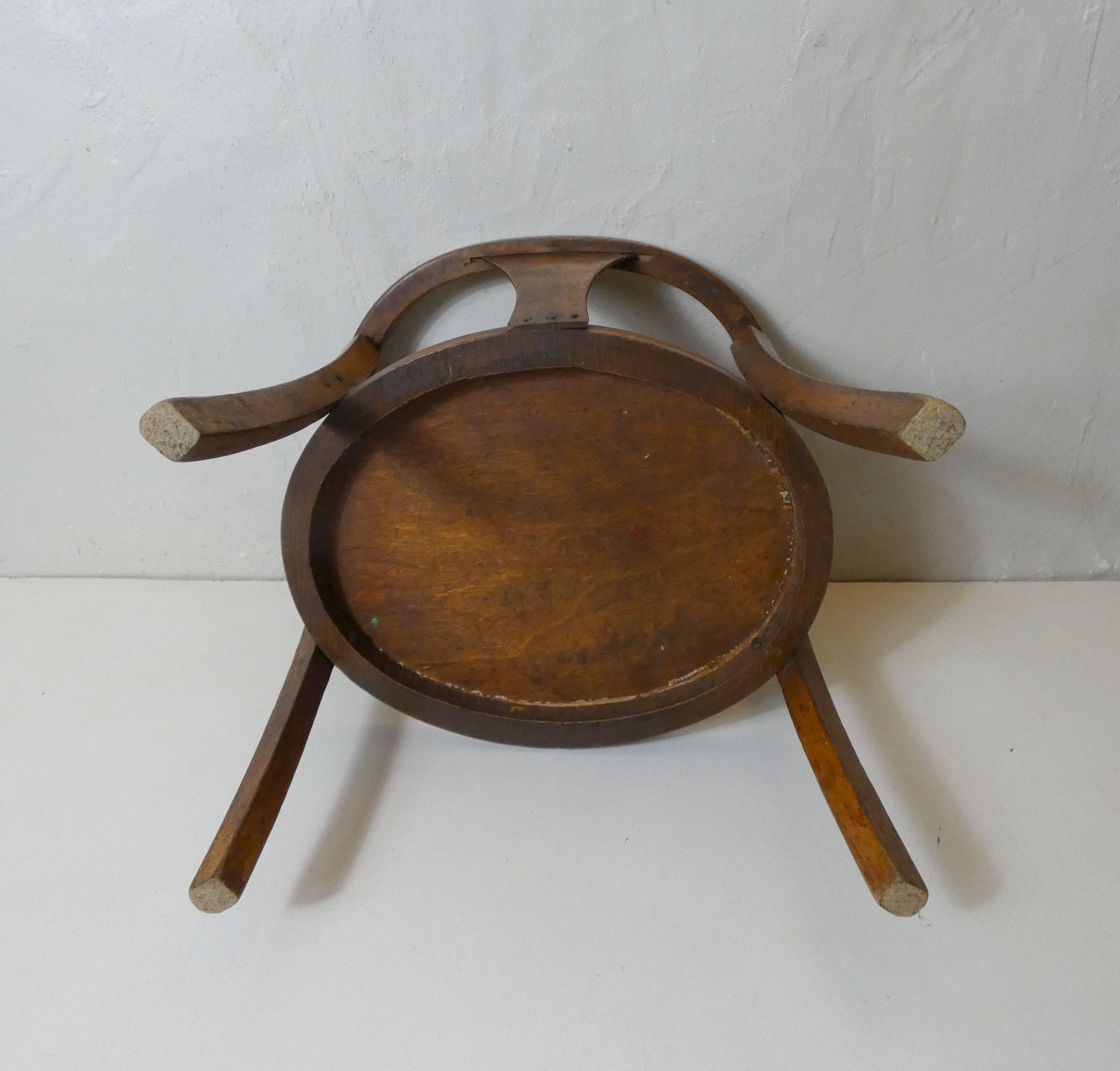 Old wooden armchair for children