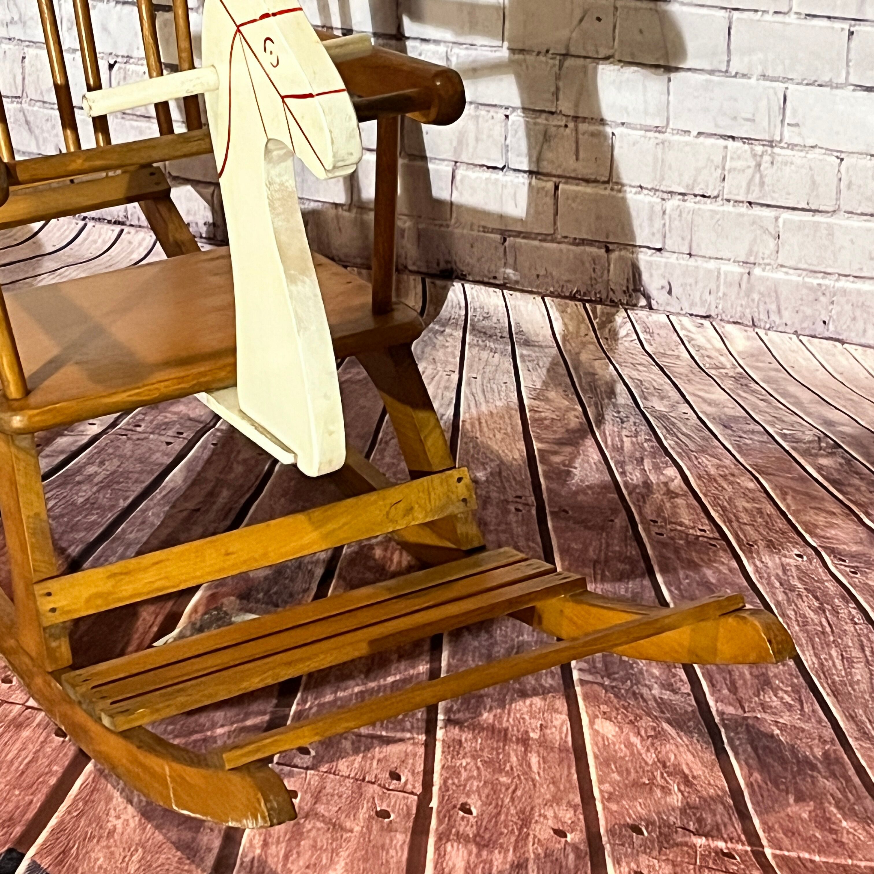 Cheval à bascule en bois