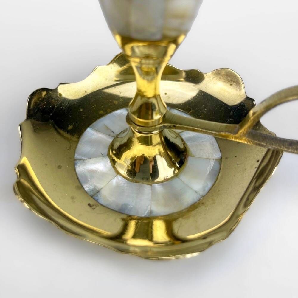 Duo of vintage brass and mother-of-pearl cellar rat candlesticks