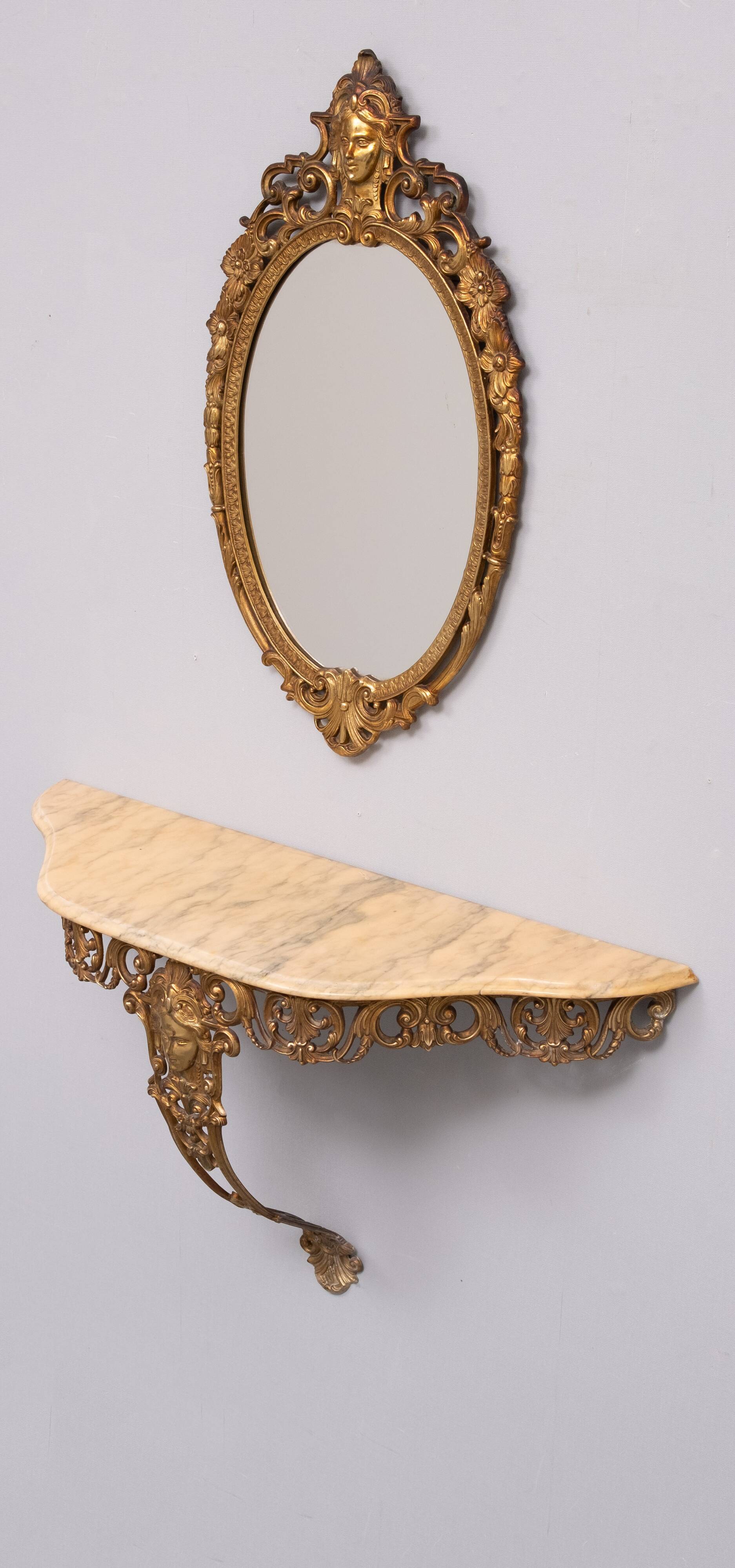 Classic gilded brass console with oval mirror from the 1950s, Italy.