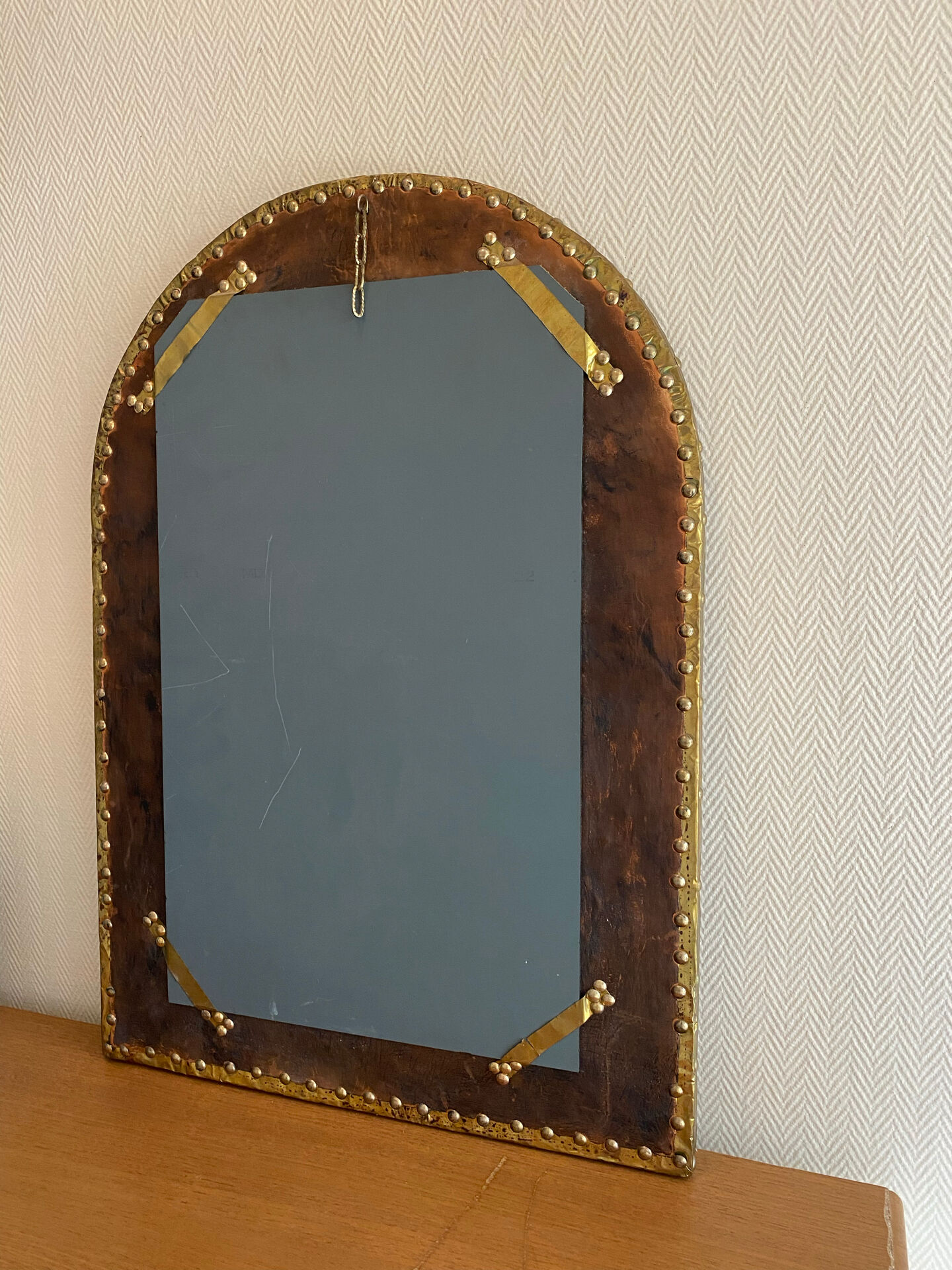 Large vintage mirror in studded leather and brass