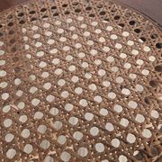 Antique marquetry side table in wood and cane.