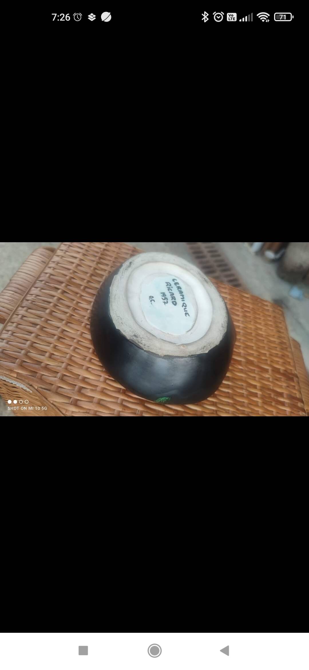 Ceramic ashtray or trinket dish in the shape of a seashell