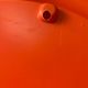 Mirror with round frame in orange molded plastic by carrara & matta, 1974
