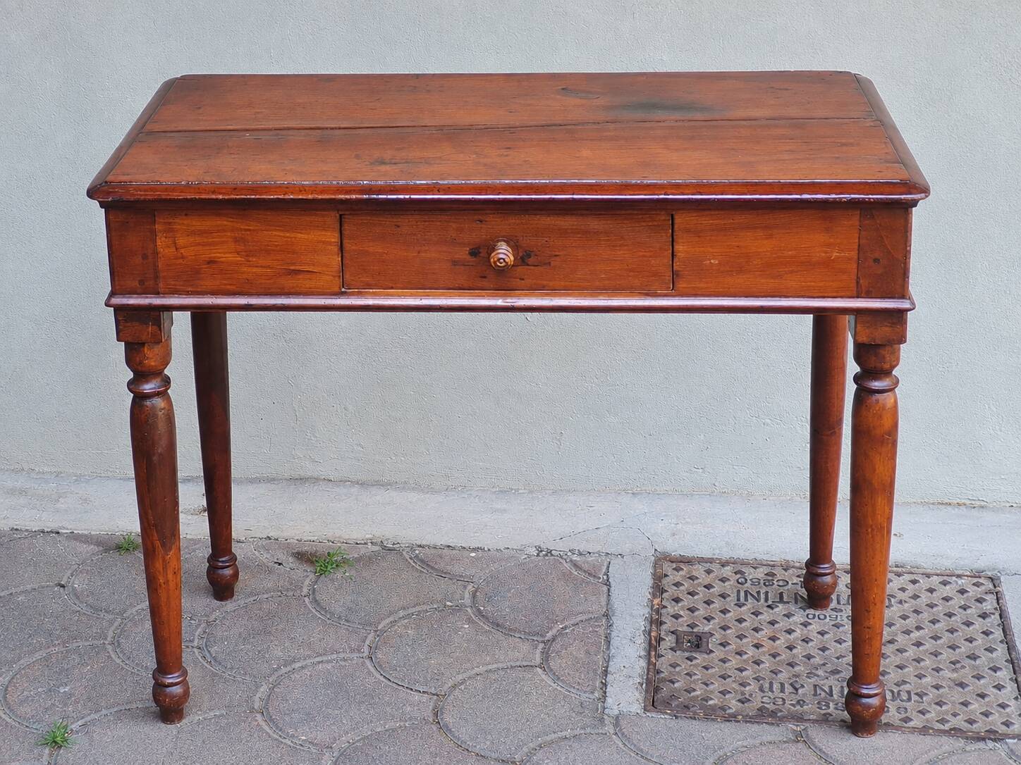 Centre writing table in stained wood