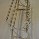 Chrome iron coat holder with a hat holder
