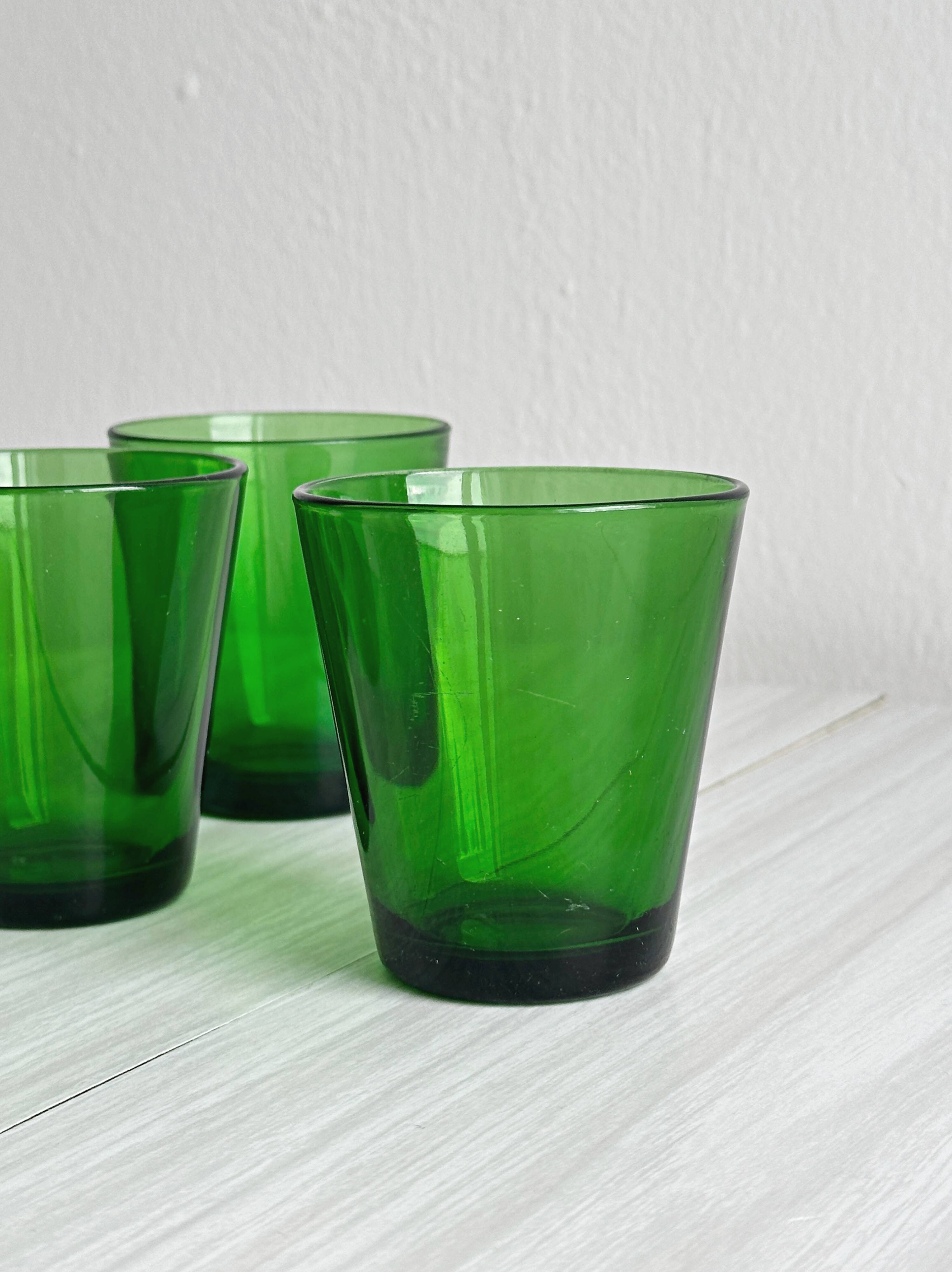 5 translucent green glasses