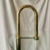 Old designer side table in tempered glass and black and gold metal