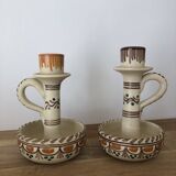 Set of two candlesticks/candle holders in orange and brown tones