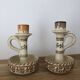 Set of two candlesticks/candle holders in orange and brown tones