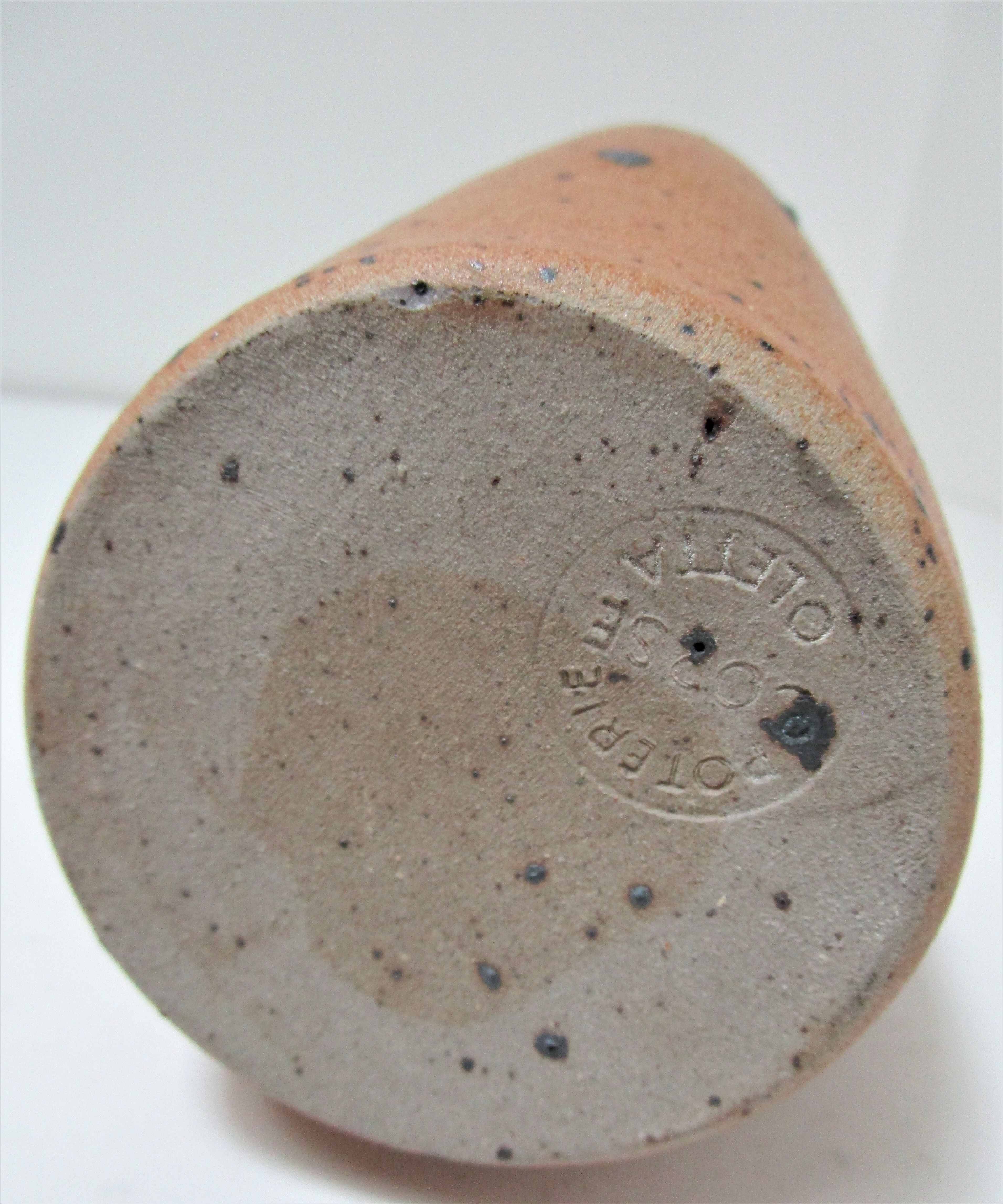 Soliflore vase in pyrite sandstone with three vintage faces