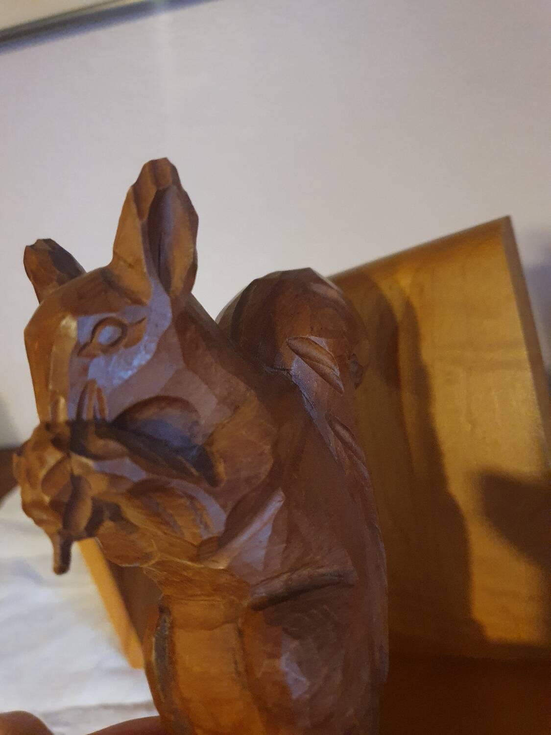 Vintage hand-carved wooden squirrel bookend