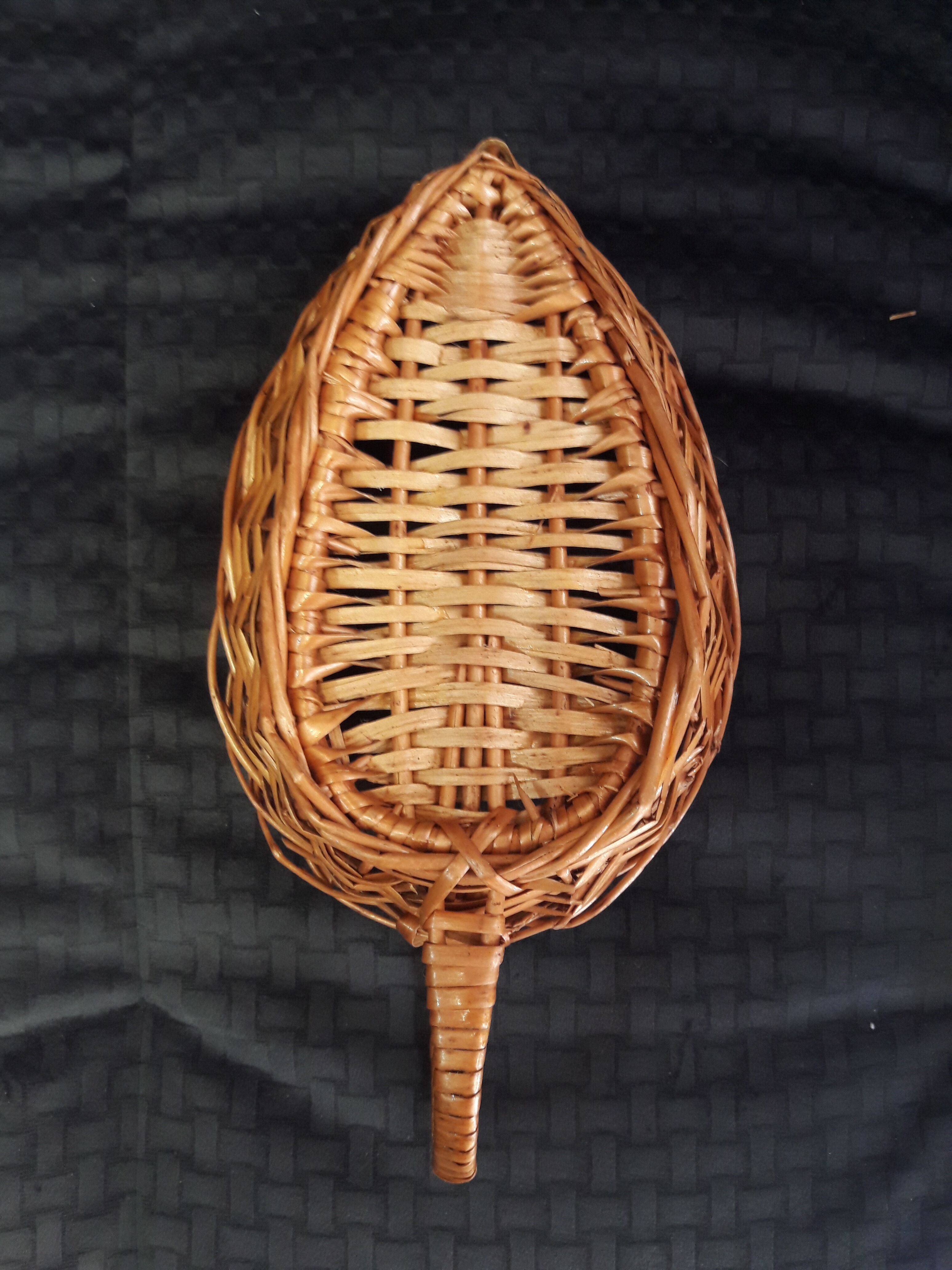 Small tray has rattan handle