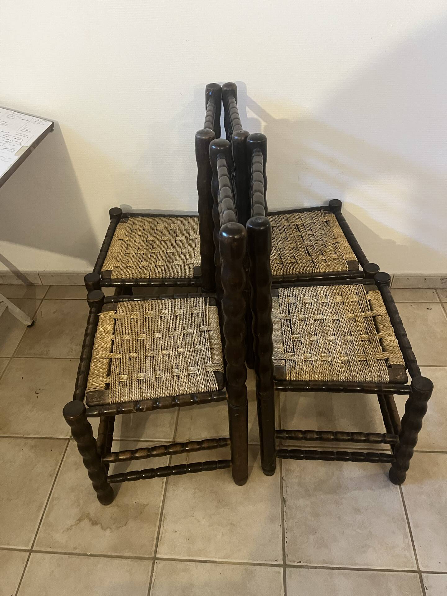Set of 4 vintage chairs in the style of Charles Dudouyt, made of turned wood and upholstered.