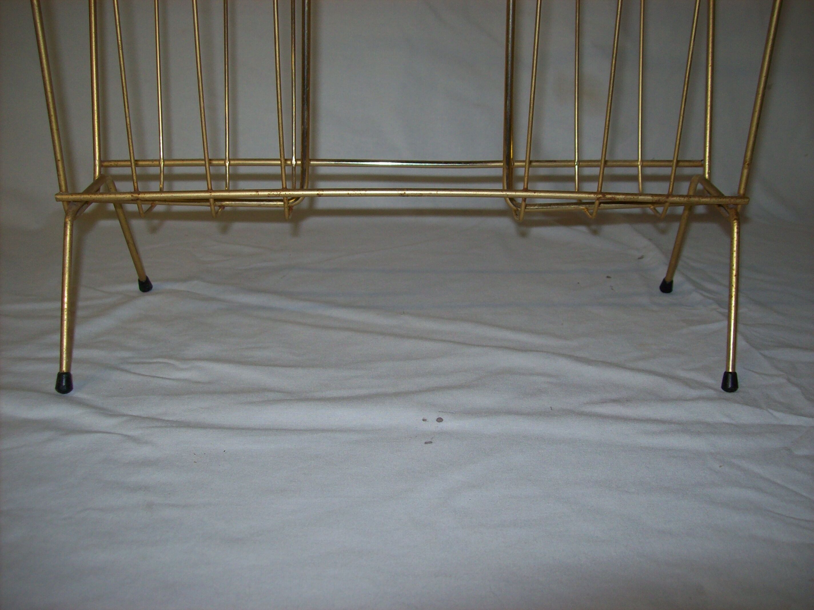 Metal magazine holder