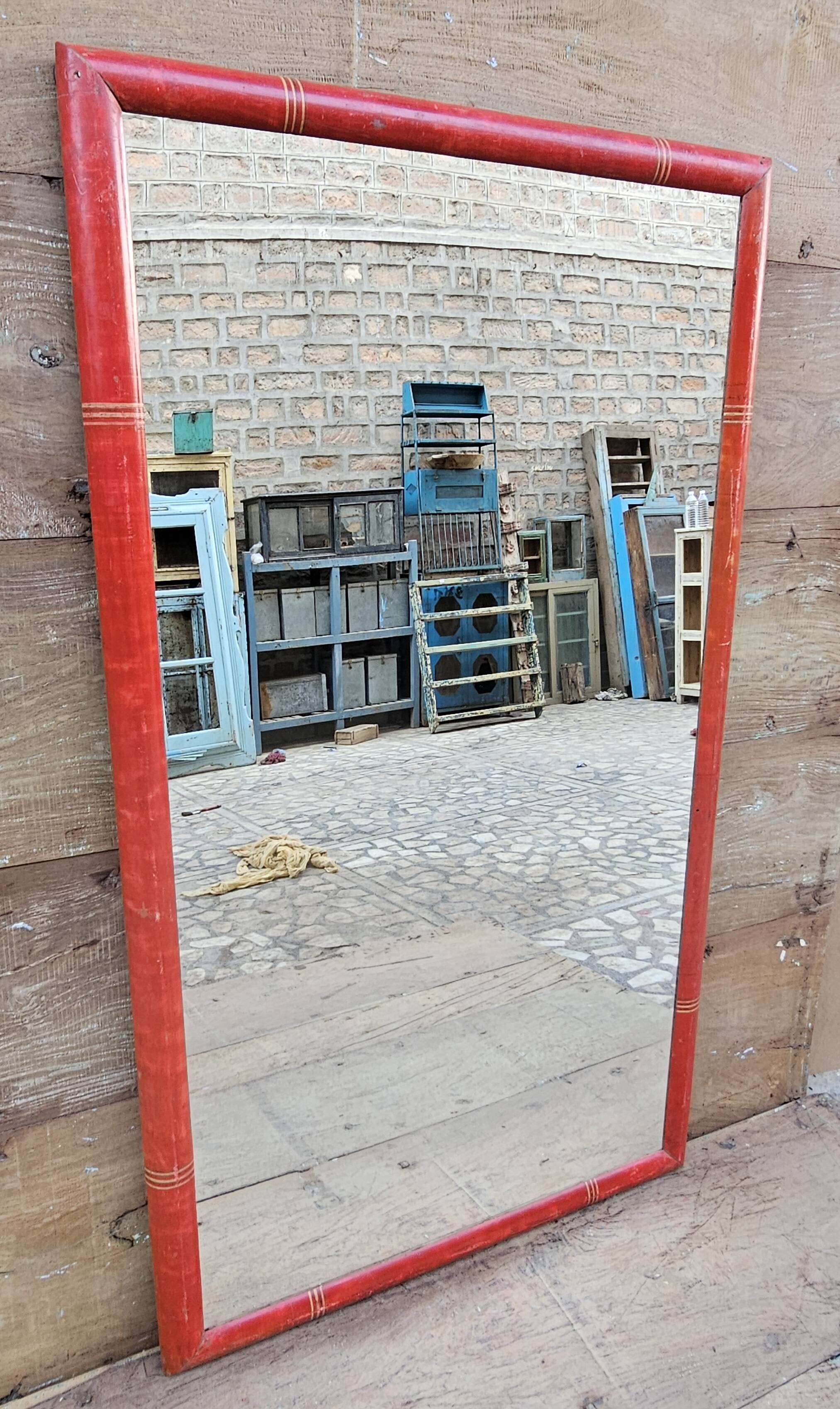 Antique mirror in Burmese teak.