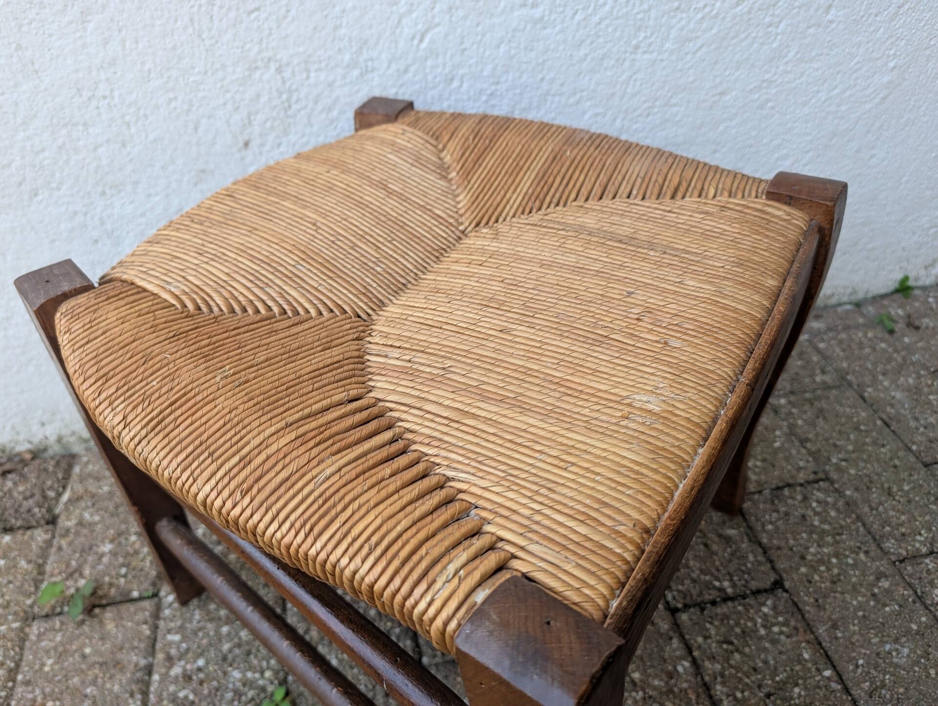 Antique solid wood stool with traditional rush seating – Late 19th century
